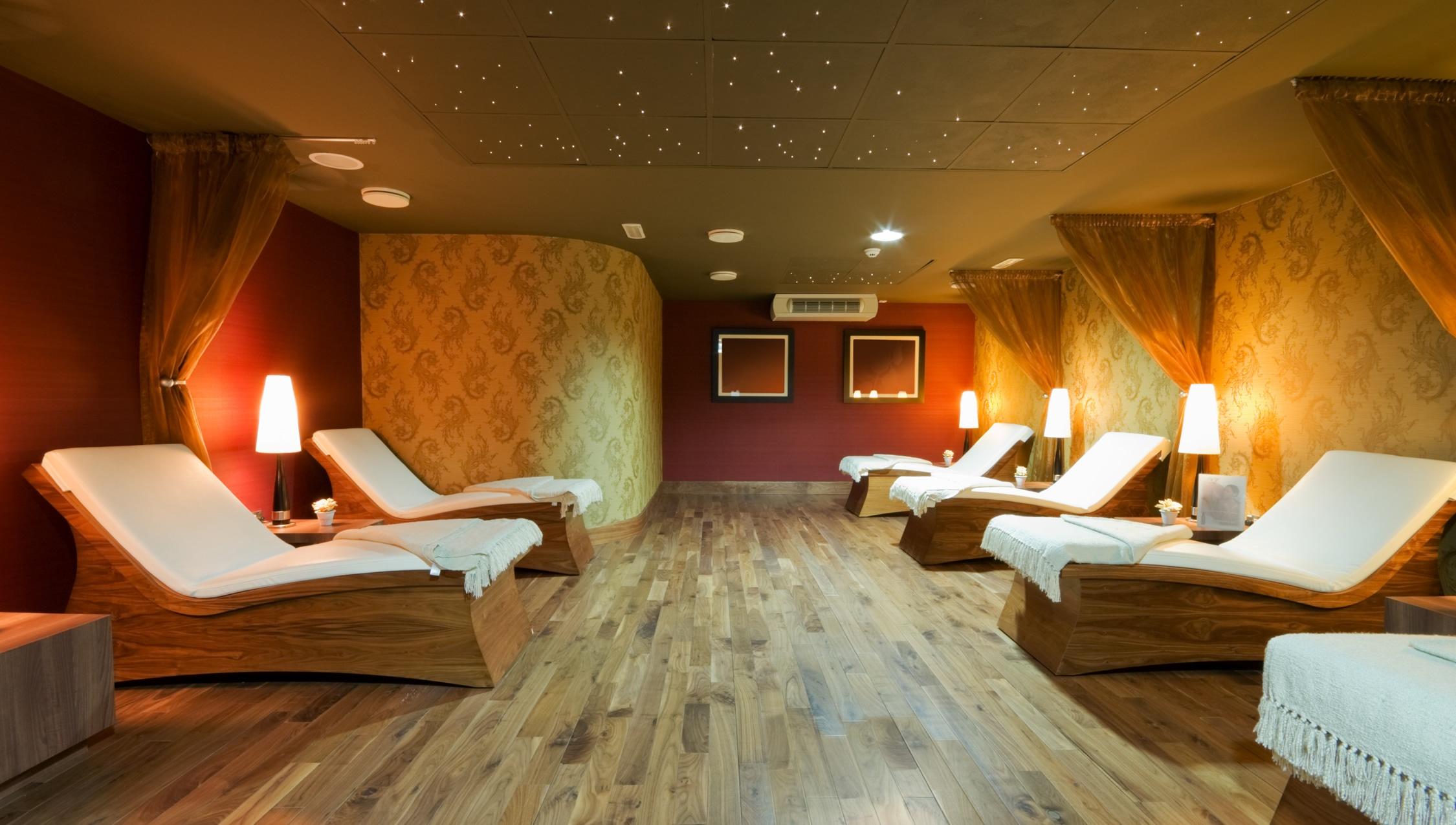 spa with red walls and star ceilings